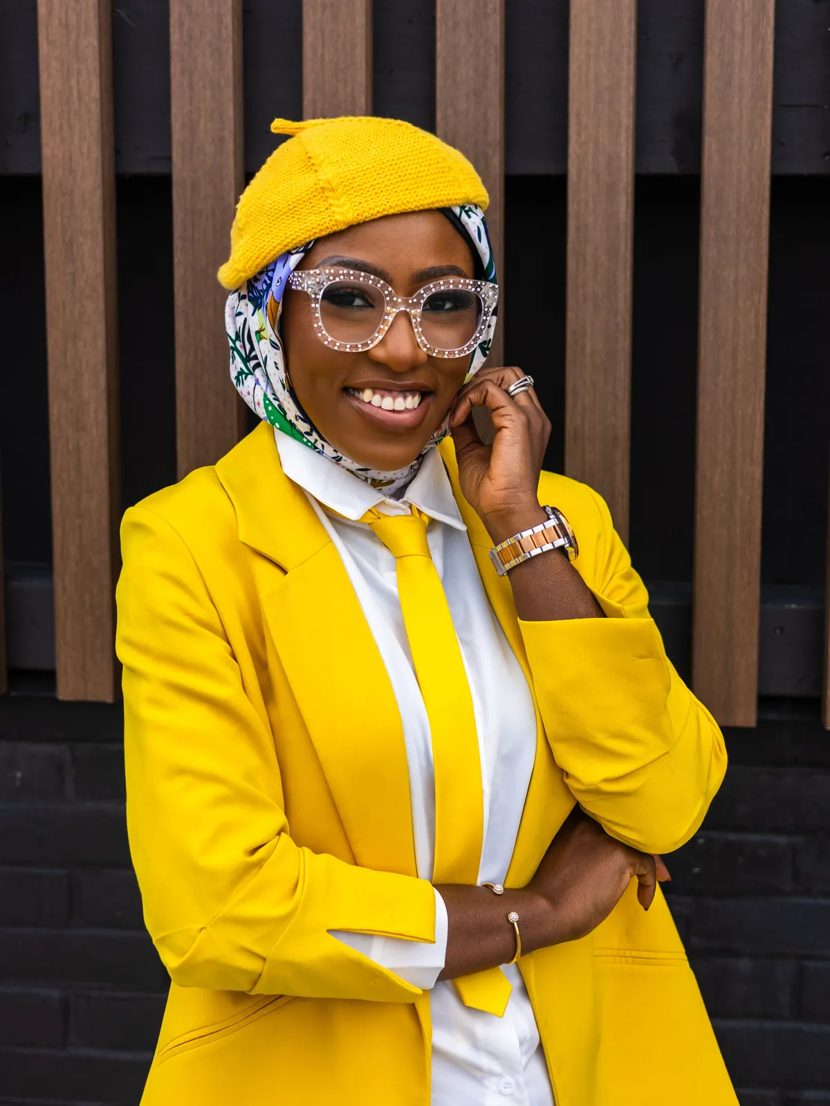 Azeezat Adejare, That Foodie Lawyer, in a yellow blazer and tie